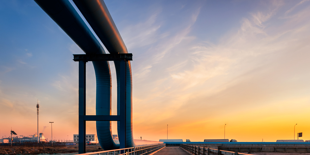 Blue pipes going to oil refinery
